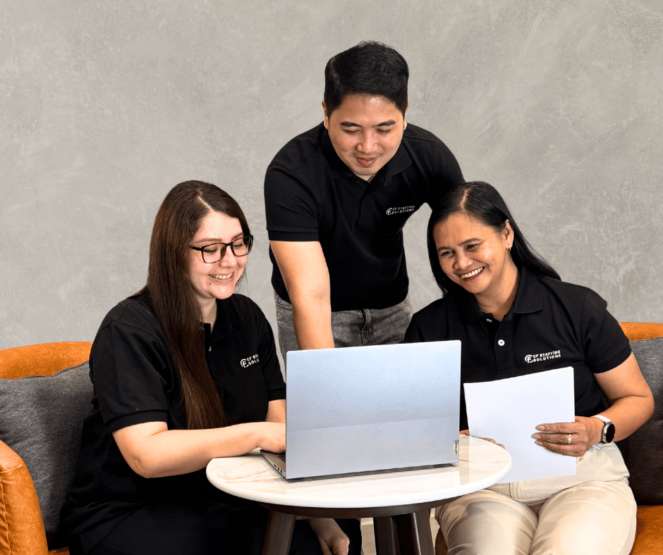 A CF Outsourcing team member at their workstation delivering client work
