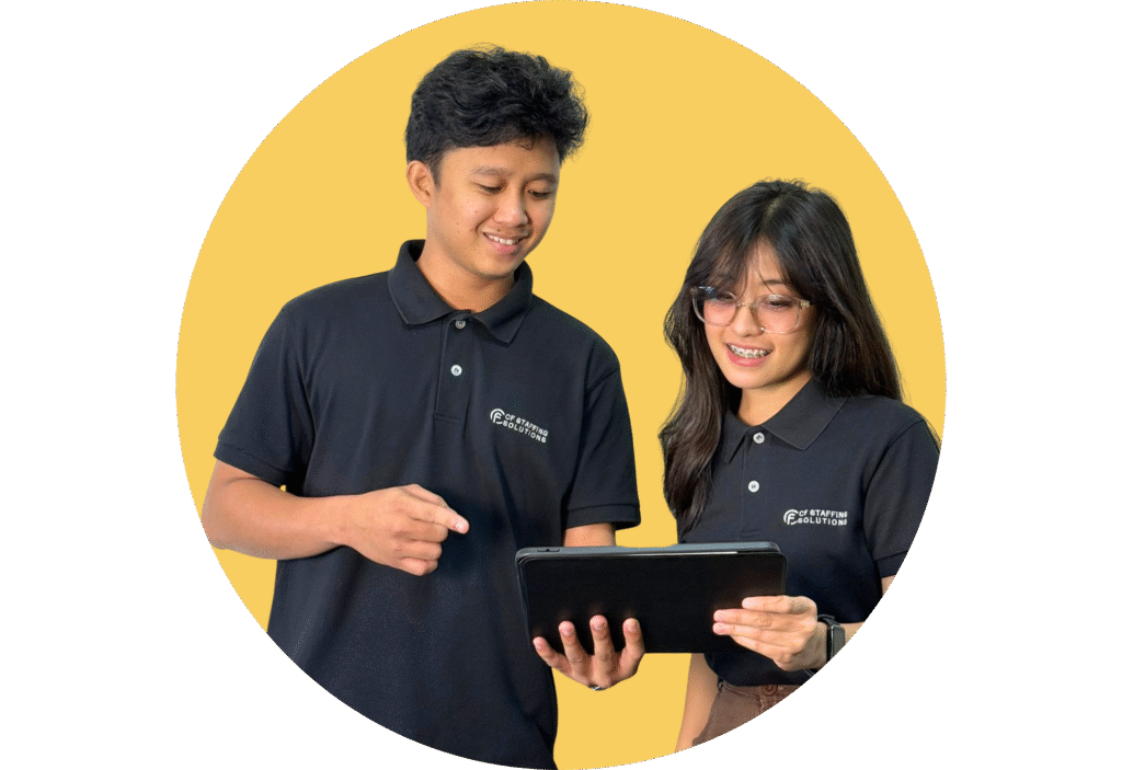 CF Outsourcing Solutions team collaborating in a modern office – professional outsourcing services in the Philippines for U.S. clients in IT, healthcare, and customer support. We are the top outsourcing company in the Philippines.