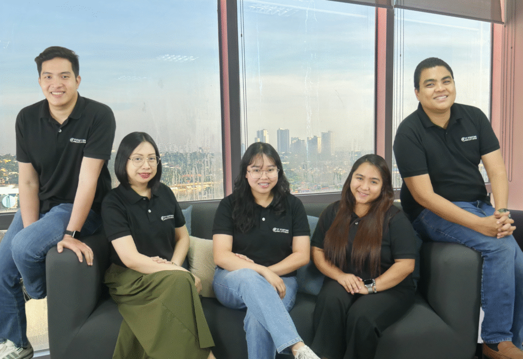 CF Outsourcing Solutions team collaborating in a modern office – professional outsourcing services in the Philippines for U.S. clients in IT, healthcare, and customer support. We are the top outsourcing company in the Philippines.
