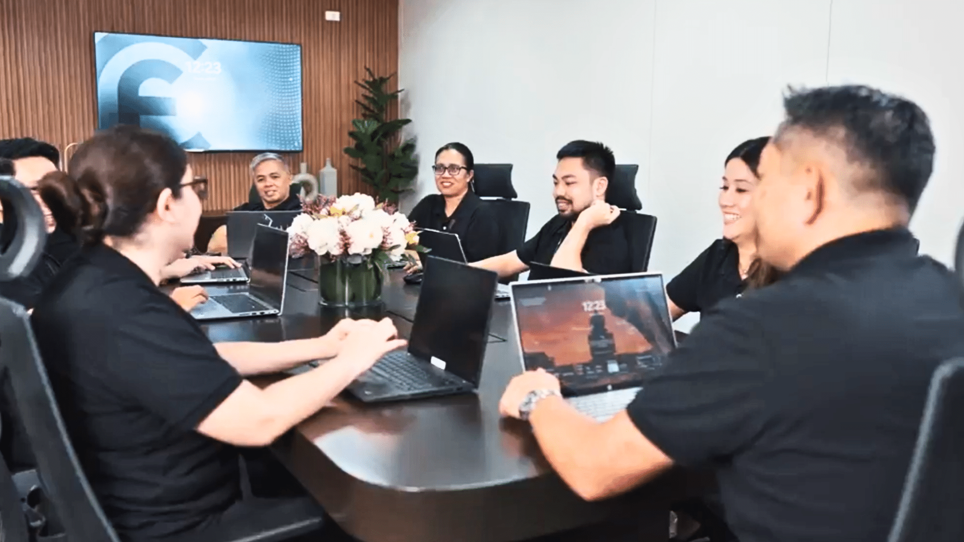 CF Outsourcing Solutions team collaborating in a modern office – professional outsourcing services in the Philippines for U.S. clients in IT, healthcare, and customer support. We are the top outsourcing company in the Philippines.