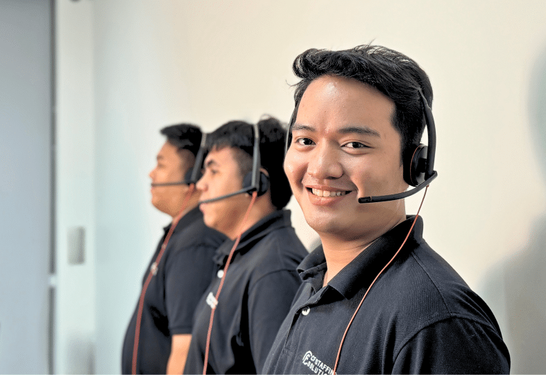 CF Outsourcing Solutions team collaborating in a modern office – professional outsourcing services in the Philippines for U.S. clients in IT, healthcare, and customer support. We are the top outsourcing company in the Philippines.