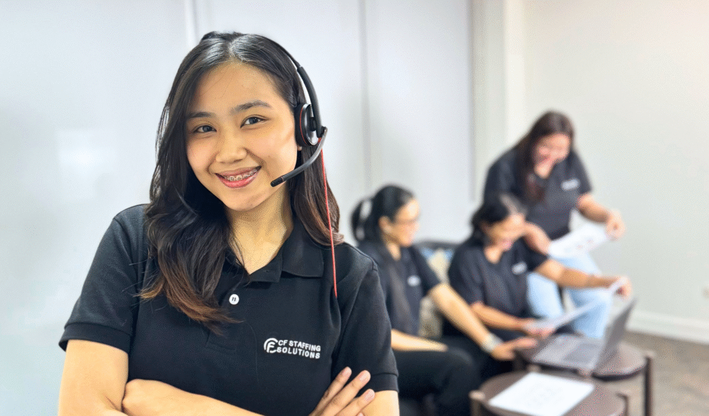 CF Outsourcing Solutions team collaborating in a modern office – professional outsourcing services in the Philippines for U.S. clients in IT, healthcare, and customer support. We are the top outsourcing company in the Philippines.