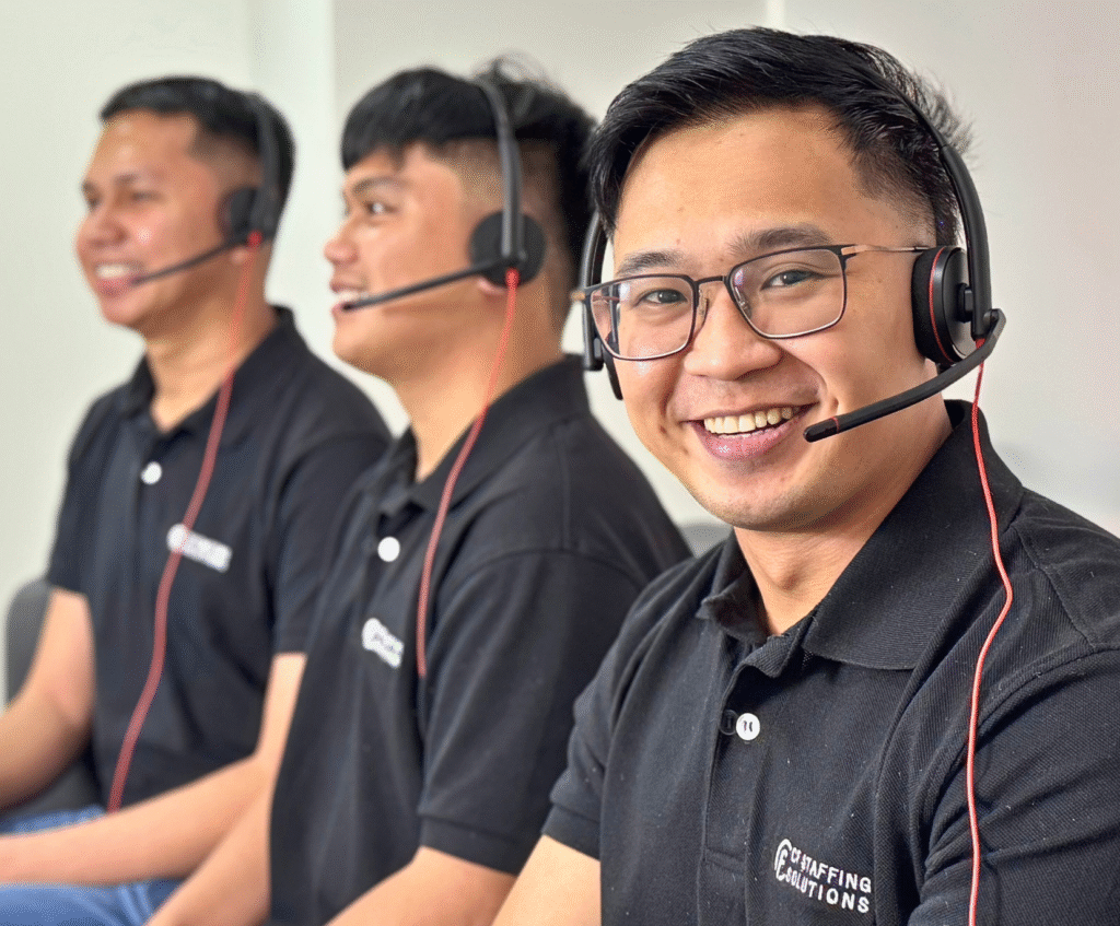 CF Outsourcing Solutions team collaborating in a modern office – professional outsourcing services in the Philippines for U.S. clients in IT, healthcare, and customer support. We are the top outsourcing company in the Philippines.
