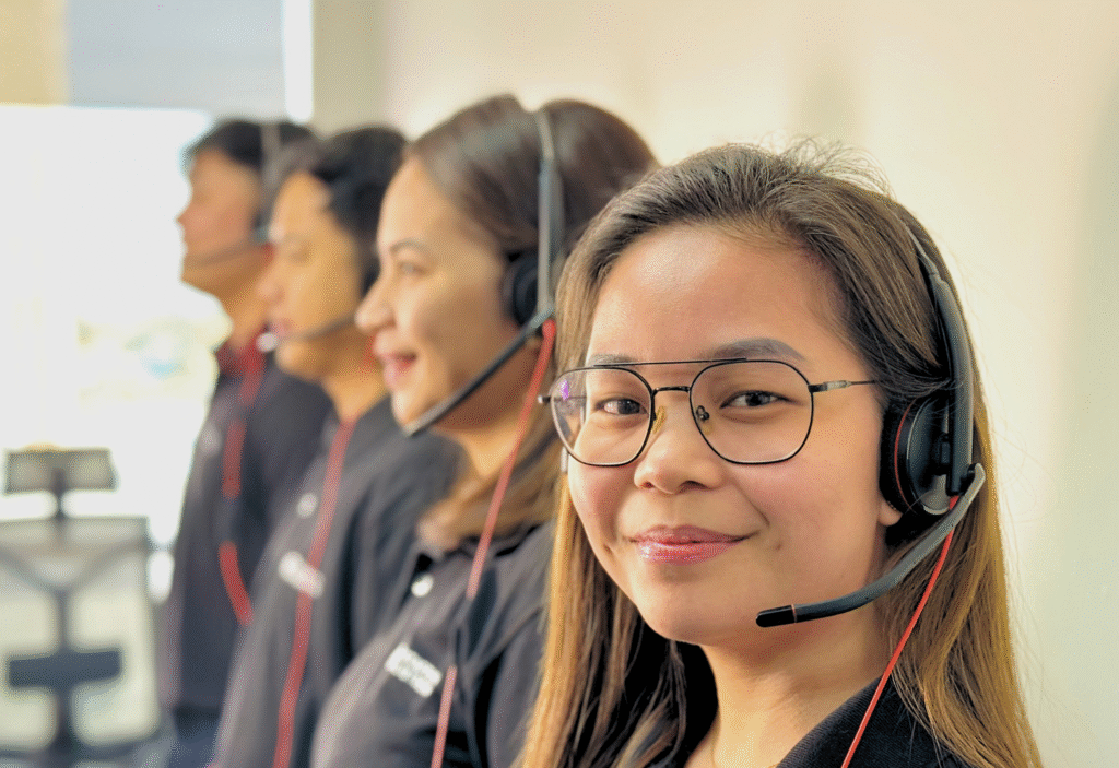 CF Outsourcing Solutions team collaborating in a modern office – professional outsourcing services in the Philippines for U.S. clients in IT, healthcare, and customer support. We are the top outsourcing company in the Philippines.