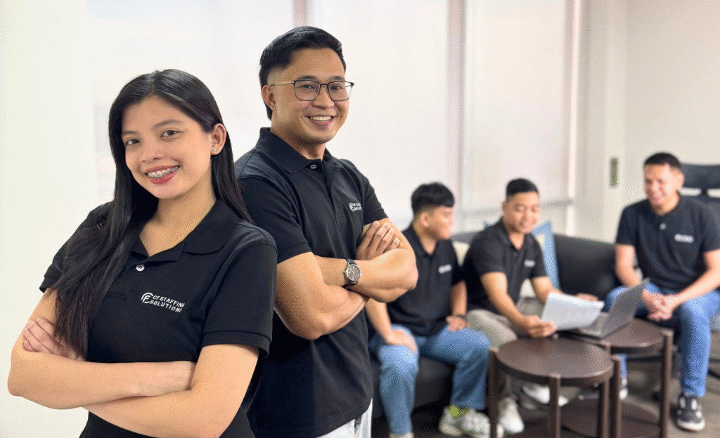 CF Outsourcing Solutions team collaborating in a modern office – professional outsourcing services in the Philippines for U.S. clients in IT, healthcare, and customer support. We are the top outsourcing company in the Philippines.